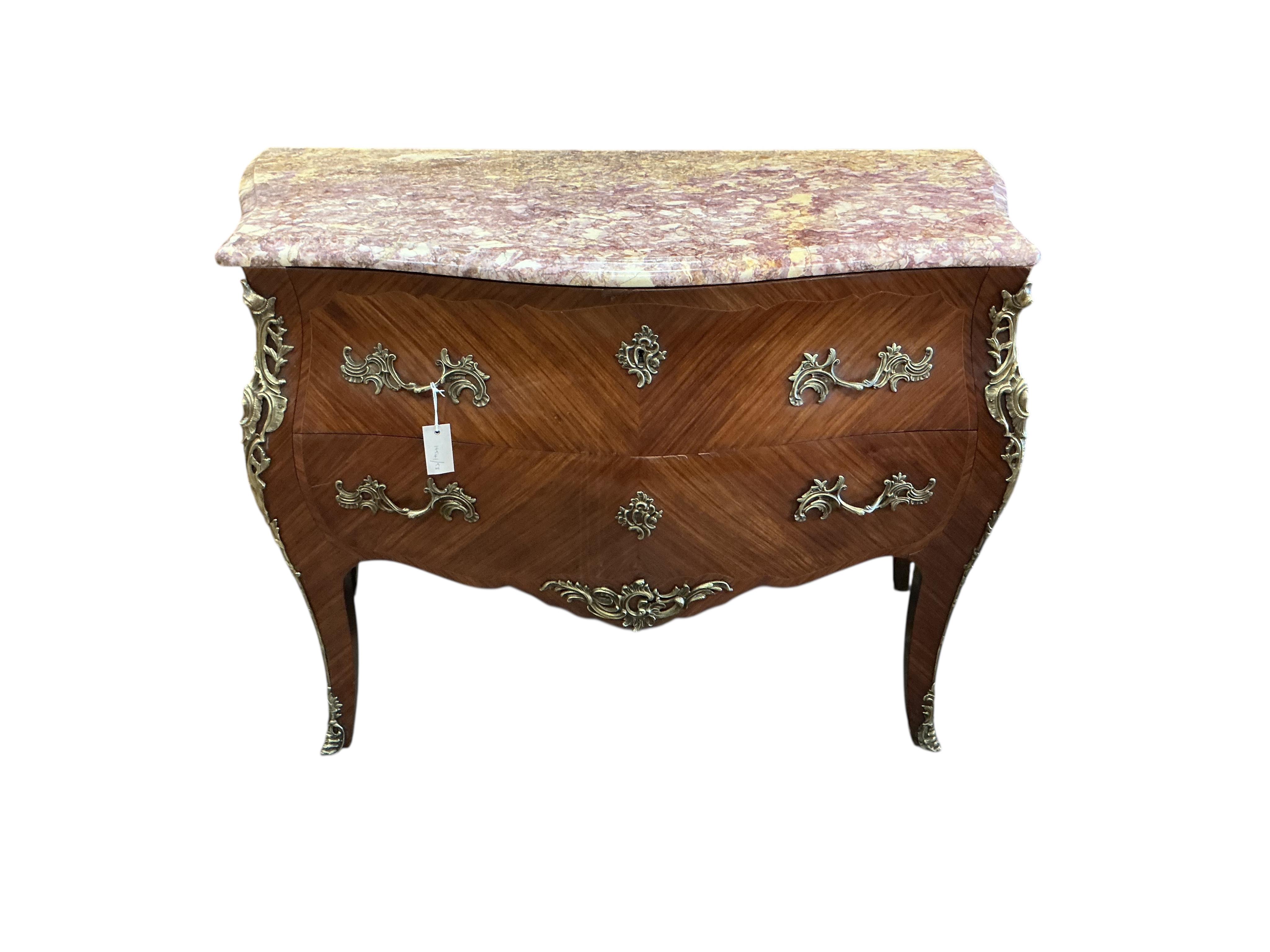 A Louis XV style gilt metal mounted marble top kingwood bombe commode, width 116cm, depth 53cm, height 86cm